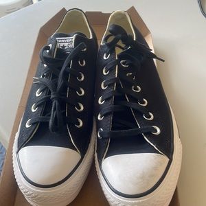 Converse chuck Taylor Women’s platform shoes.